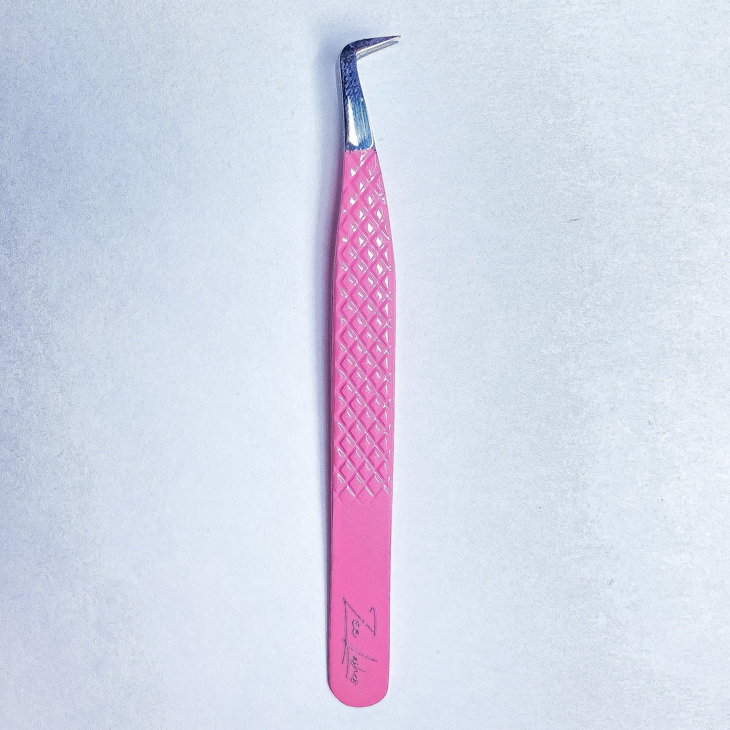 “Pick Me Up” Volume Tweezer